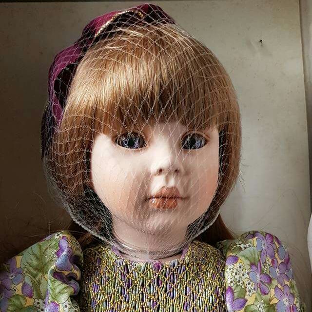 repainting porcelain dolls