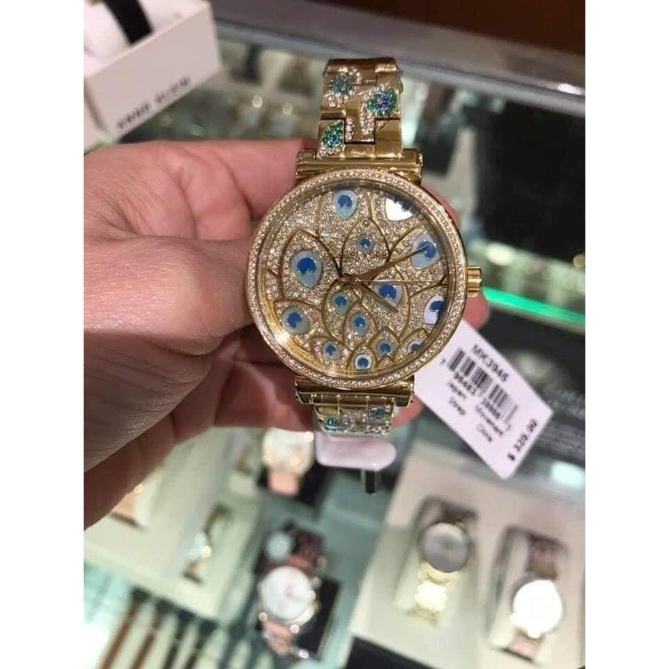 mk peacock watch