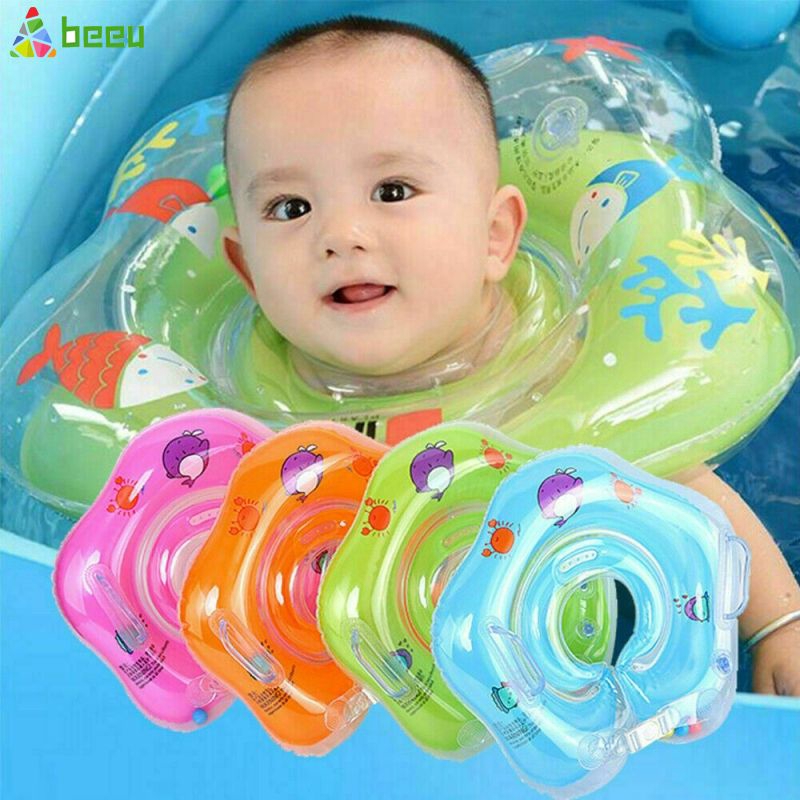babies swimming with neck float