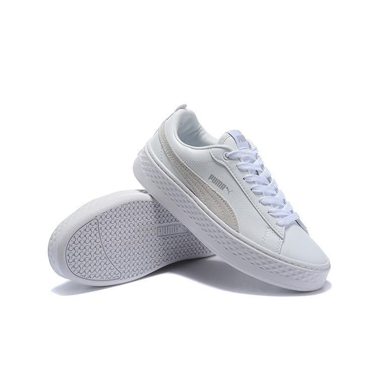 white platform puma sneakers