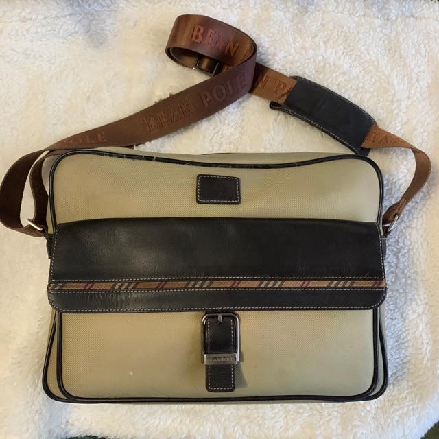 cream messenger bag