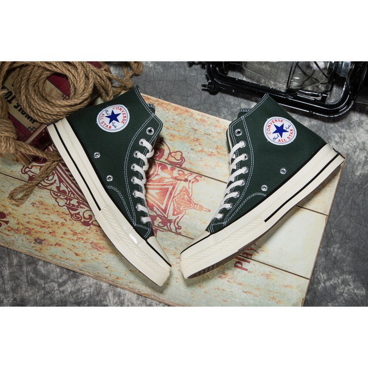 skating in converse high tops