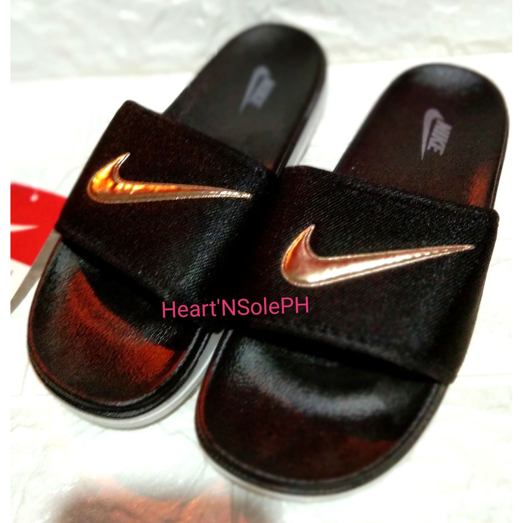 black and gold nike slides