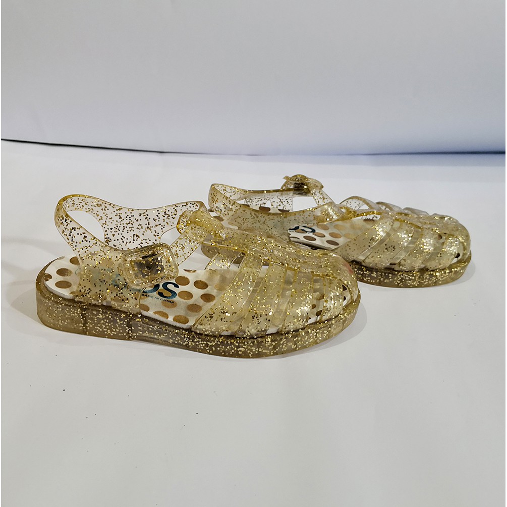gold jelly shoes