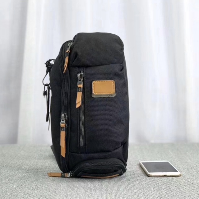tumi cross bag