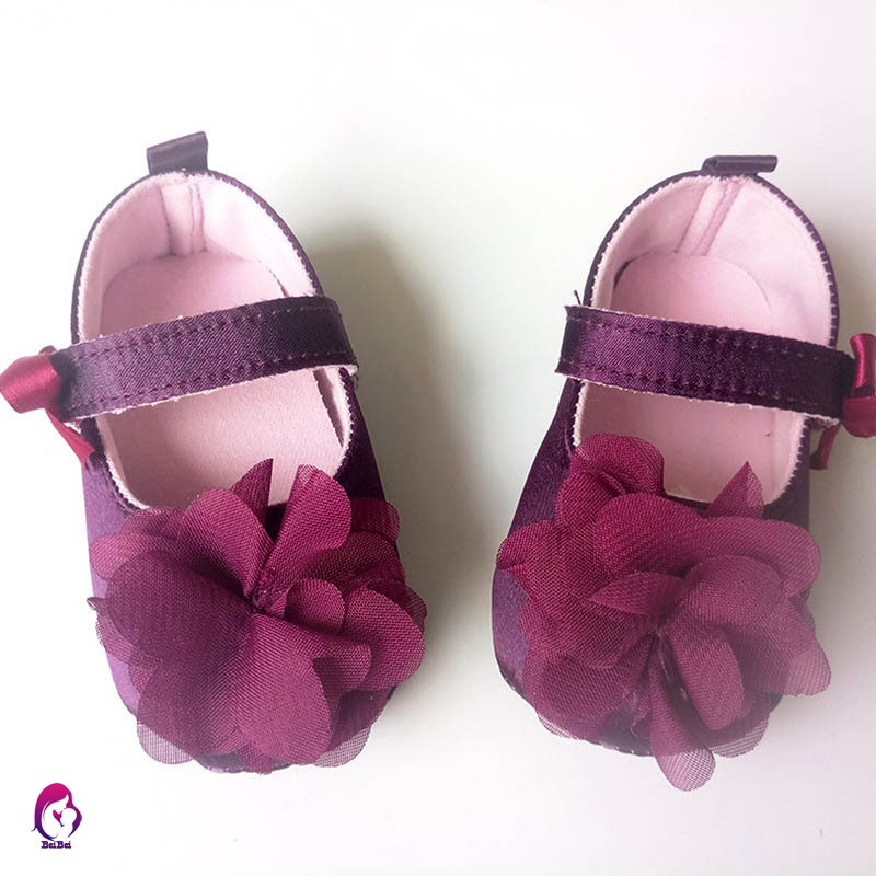 purple infant shoes