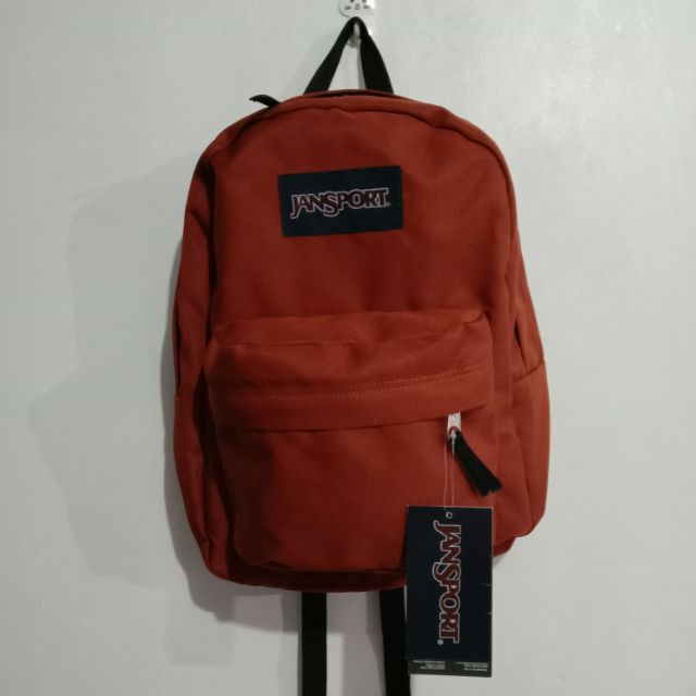 red jansport backpack