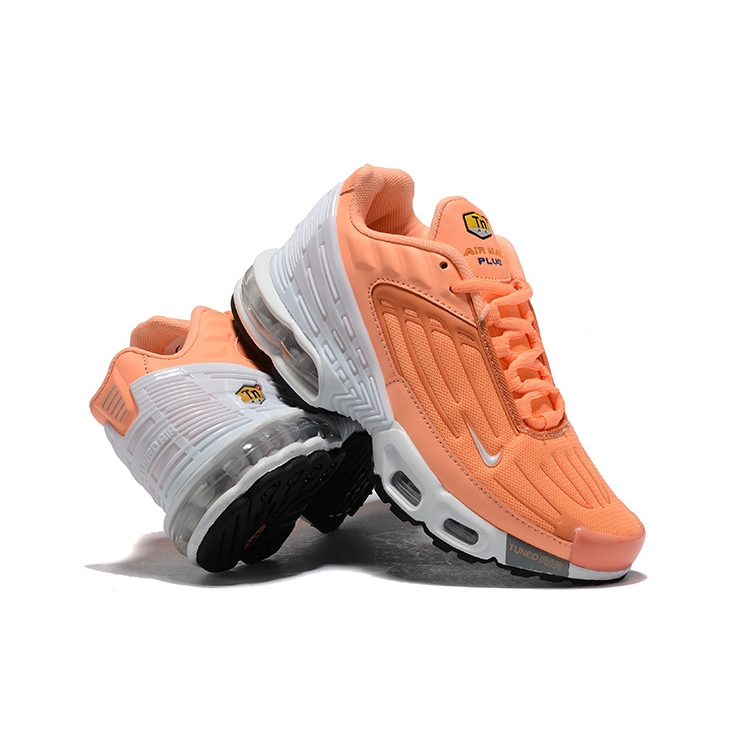 orange and white nike shoes