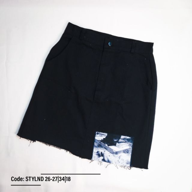 black ripped skirt