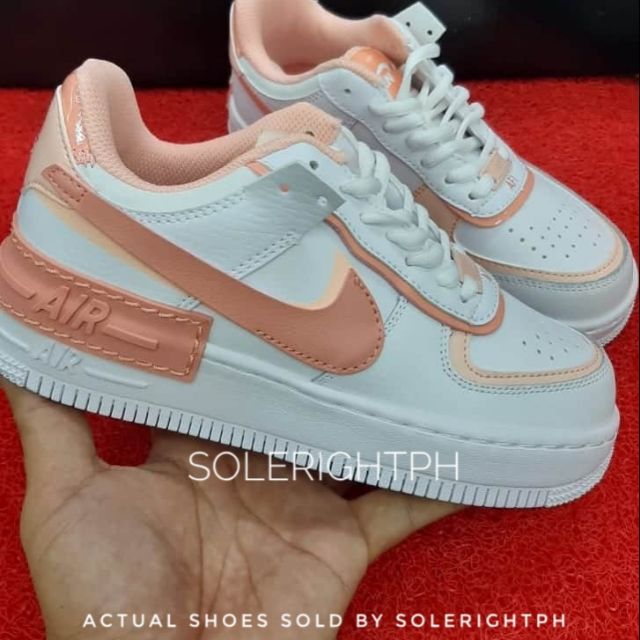 nike white pink shoes