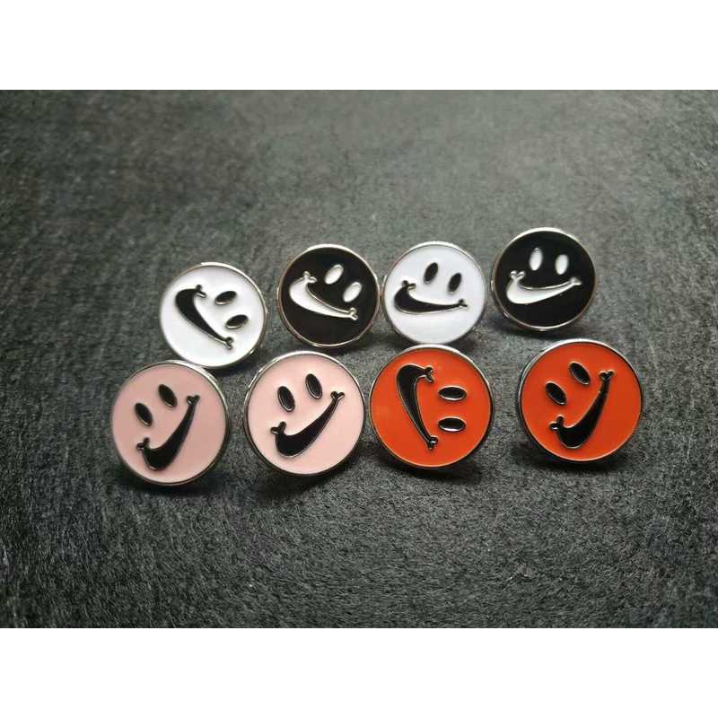 silver nike swoosh pin