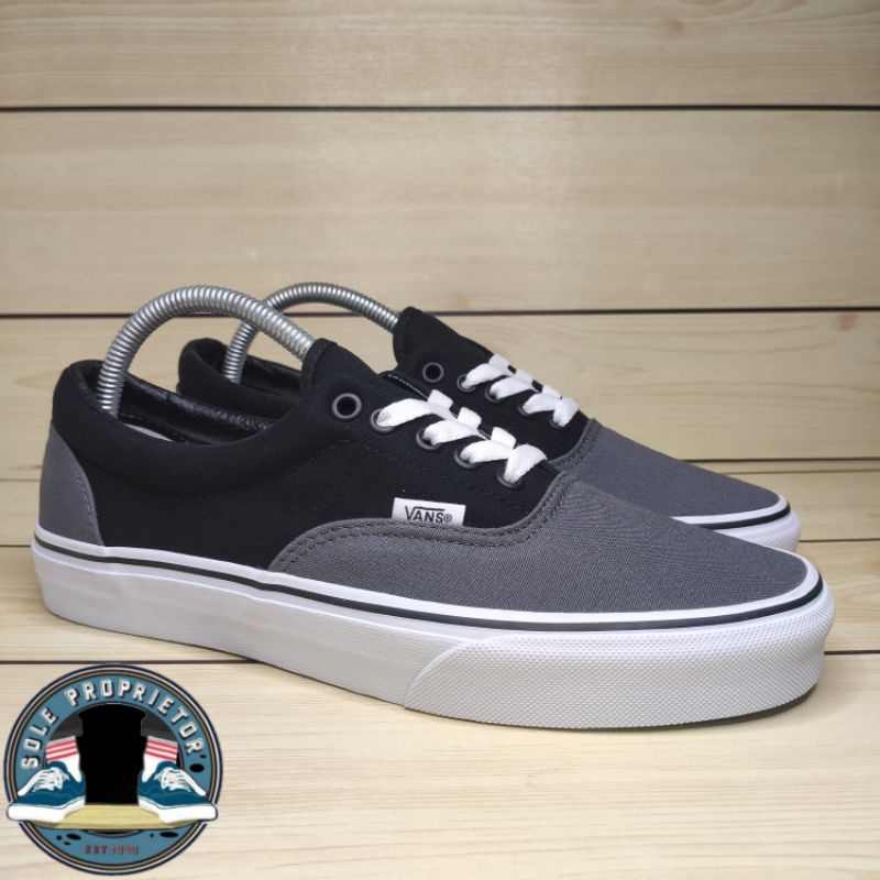 black and grey vans era
