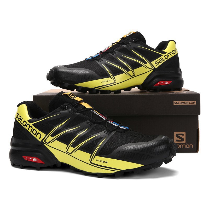 yellow salomon shoes