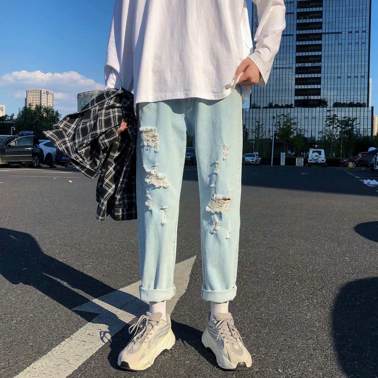 polo and ripped jeans