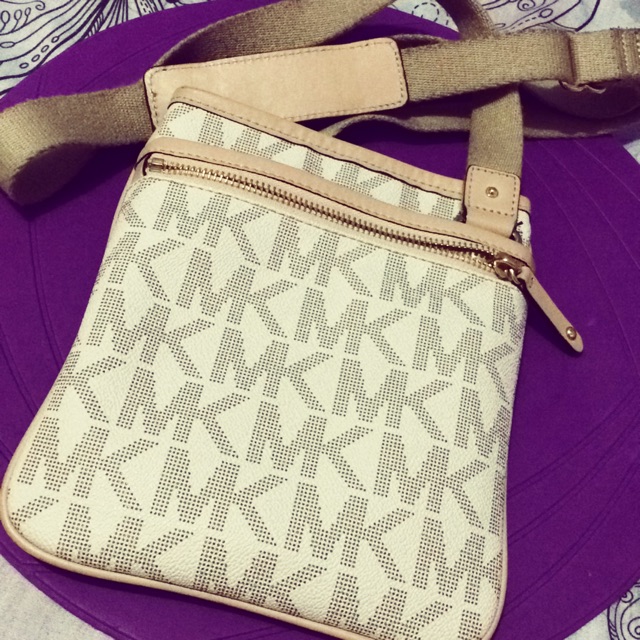 mk sling bag canada