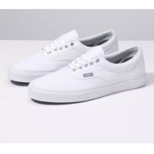 white canvas sneakers shoes