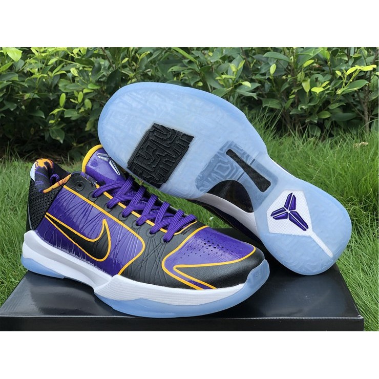 purple and gold tennis shoes