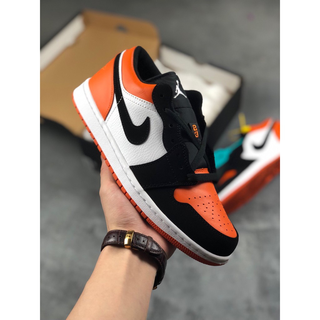 jordan 1 low orange and black