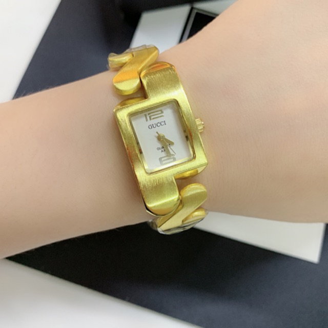 gucci zig zag gold watch price