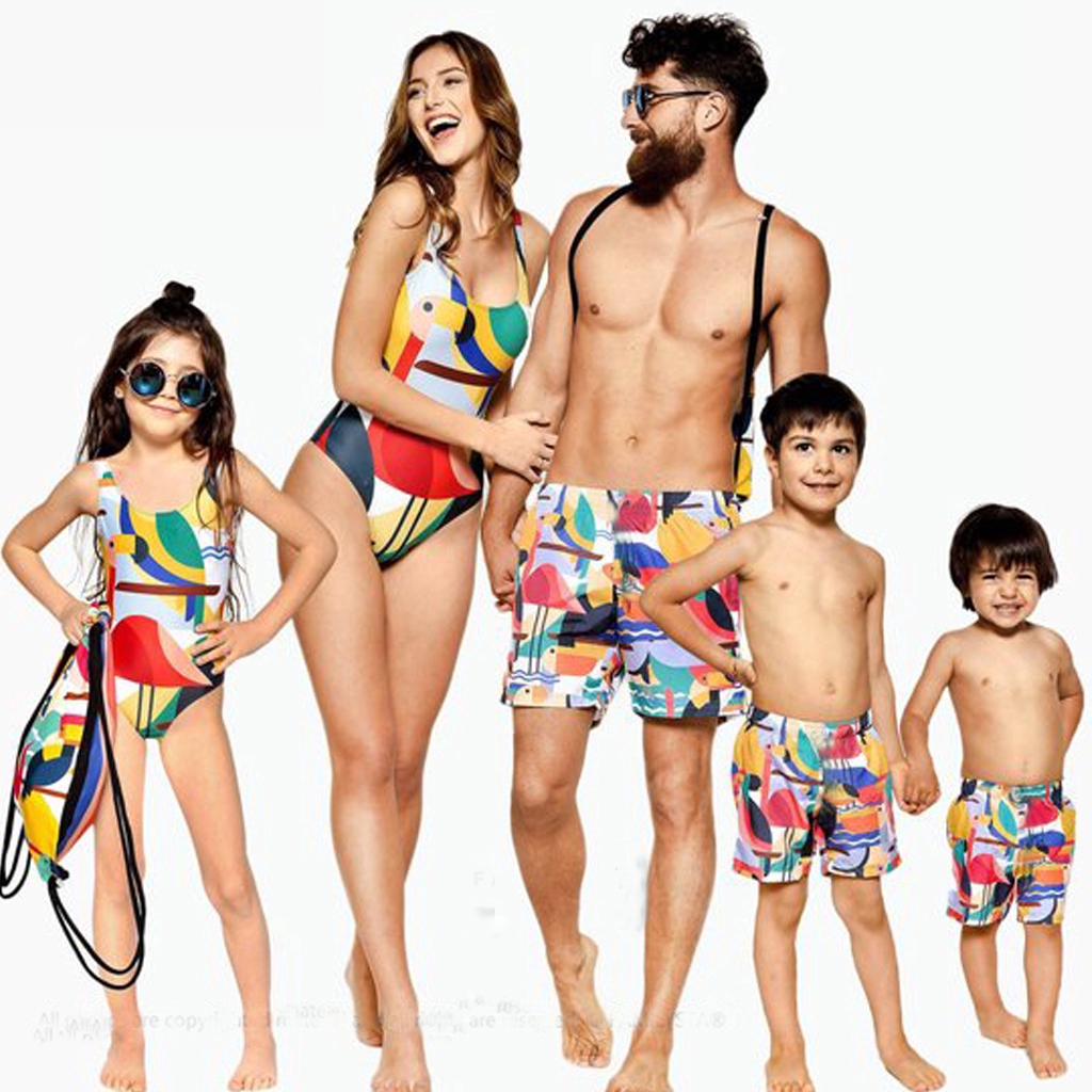 man and woman matching swimsuits