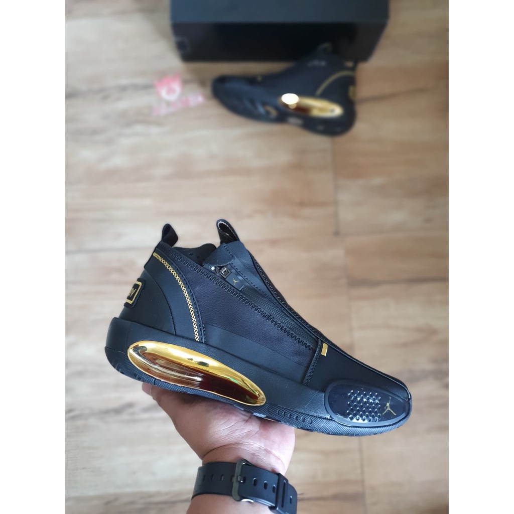 jordan 34 black and gold