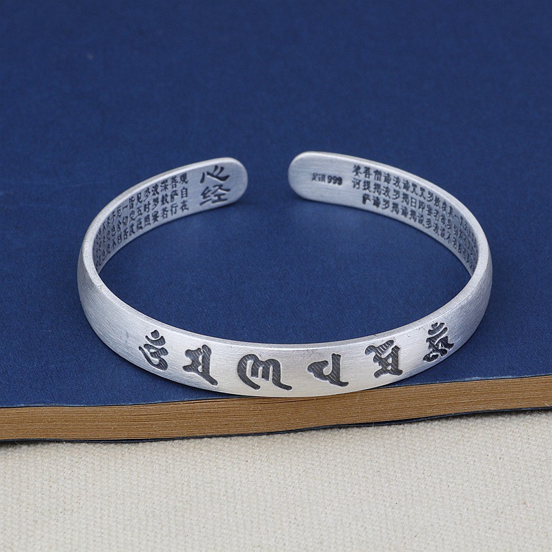 silver bracelet with words