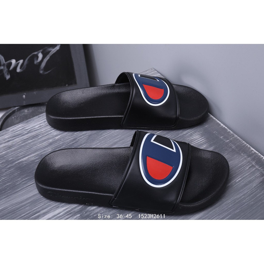 black champion flip flops