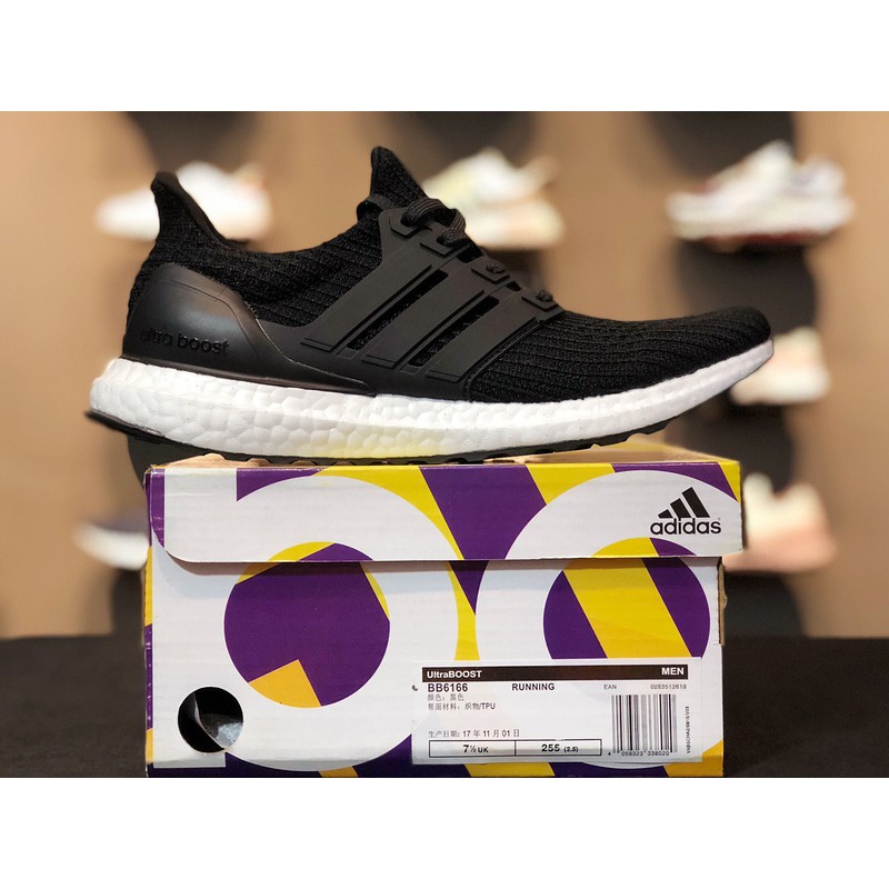 white and black adidas running shoes