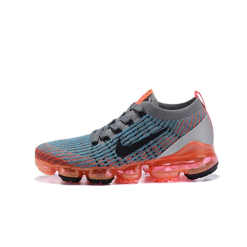 gray and orange vapormax