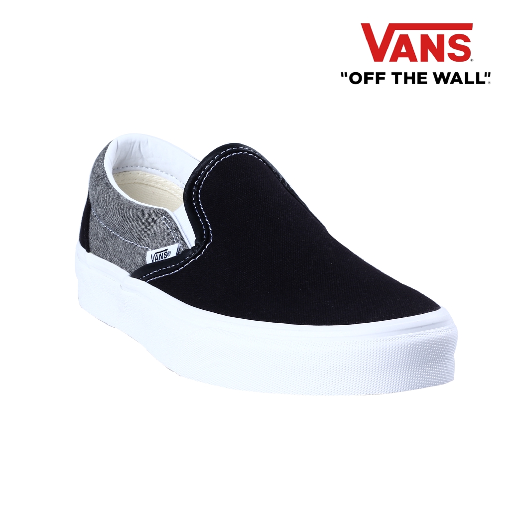 vans slip on black canvas