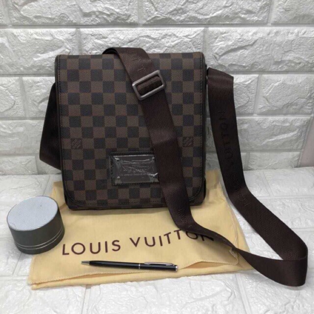 louis vuitton sling pouch