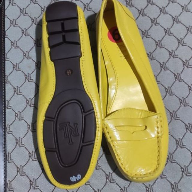 branded yellow shoes
