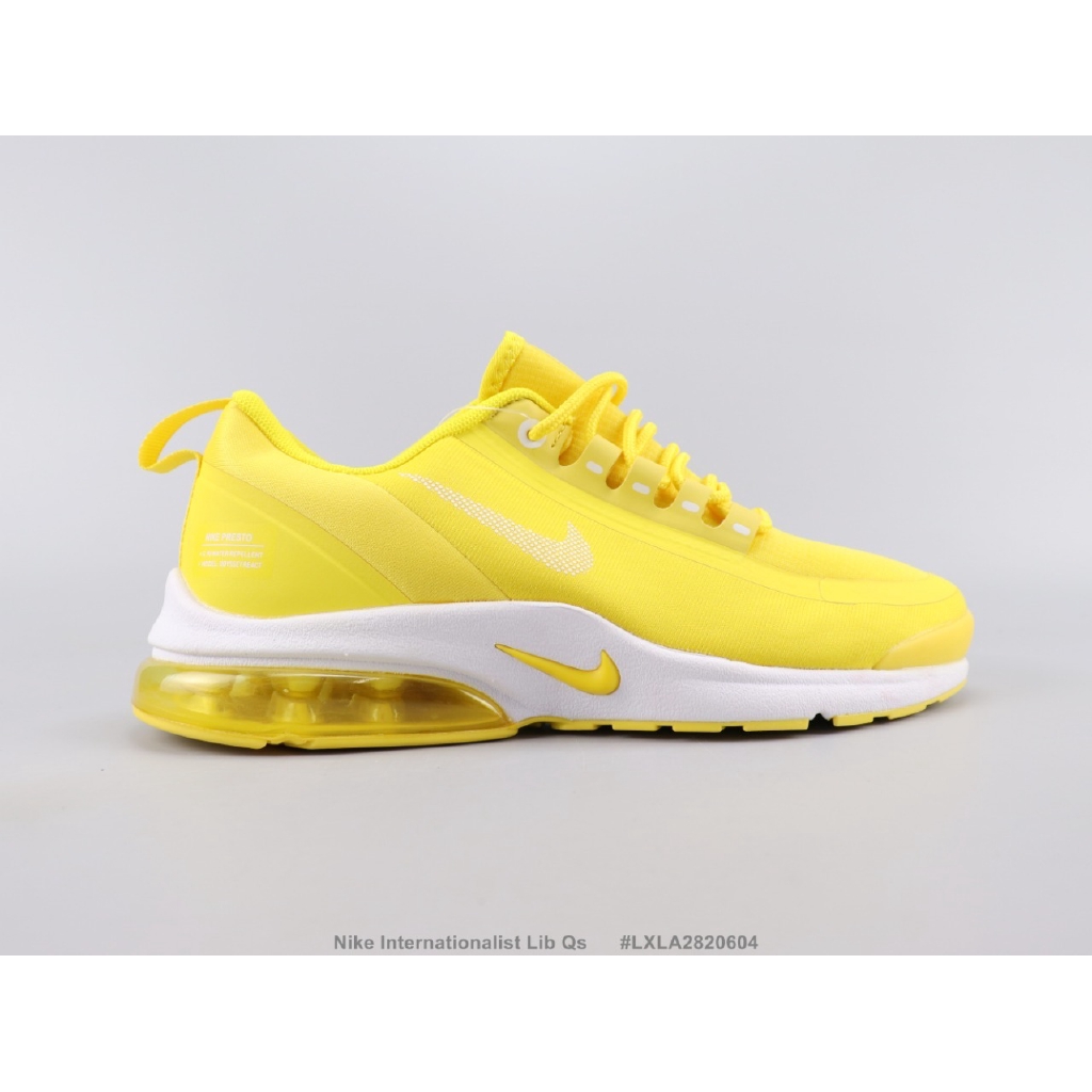 nike yellow internationalist trainers