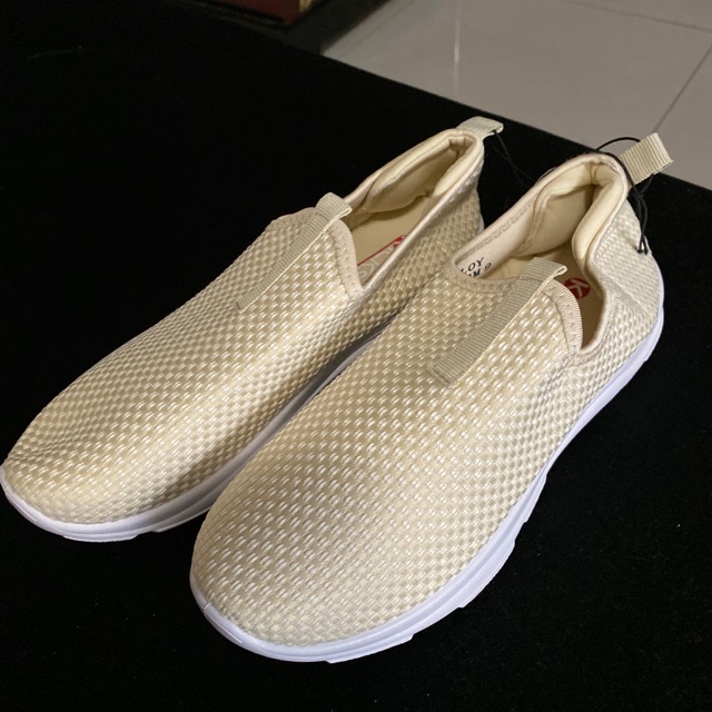 cream slip on sneakers