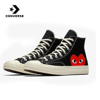 converse with red heart on side