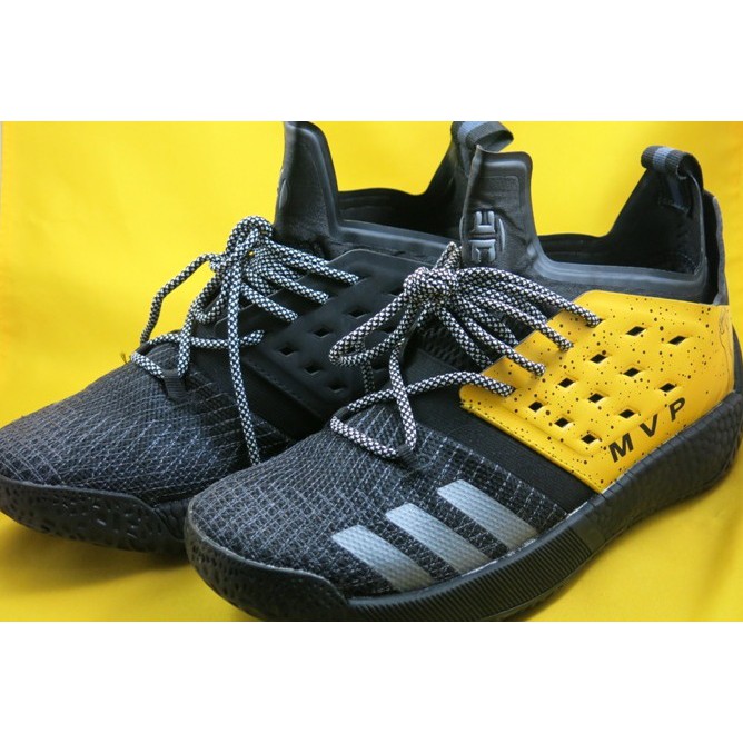 black and yellow adidas shoes