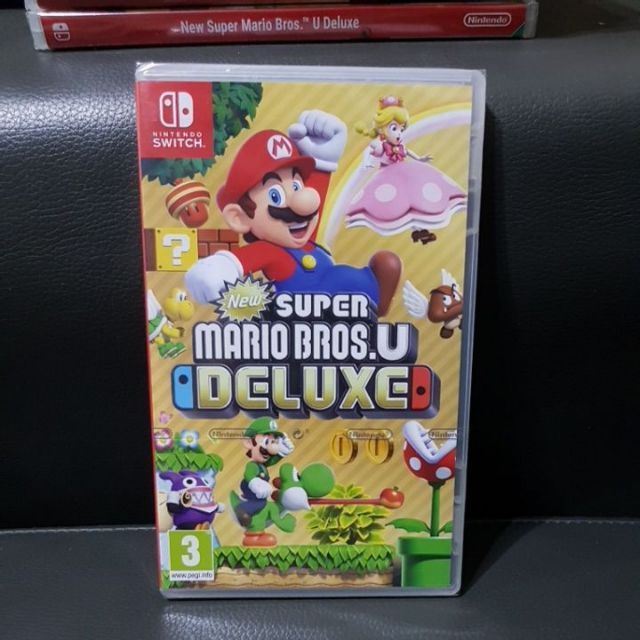 nintendo switch with super mario bros u deluxe