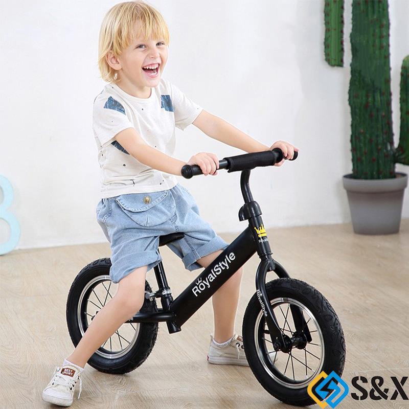 children driving bike