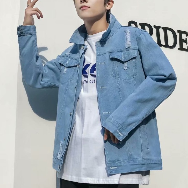 green jacket blue jeans