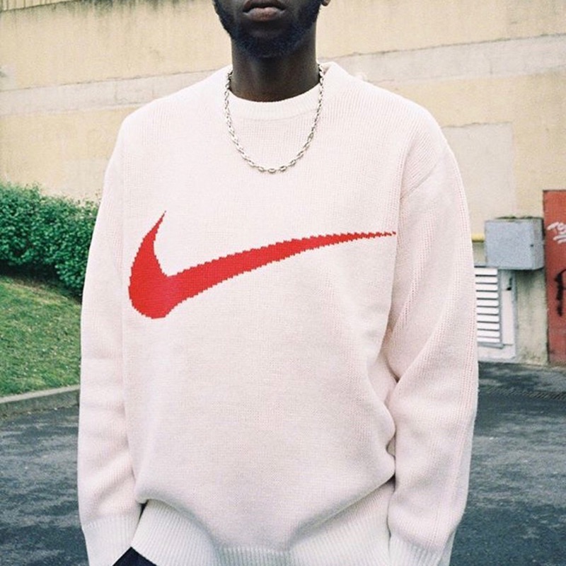 swoosh sweater