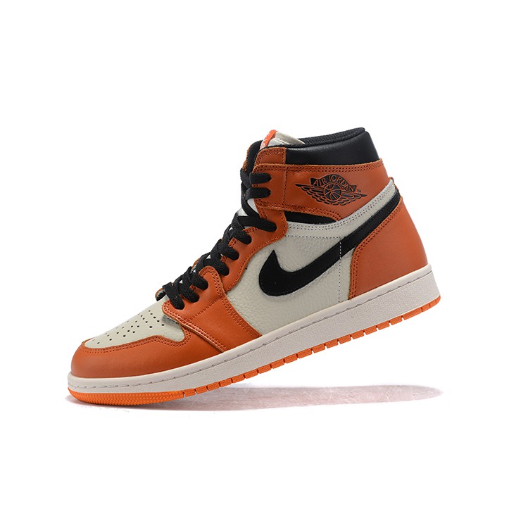 orange and black basketball shoes