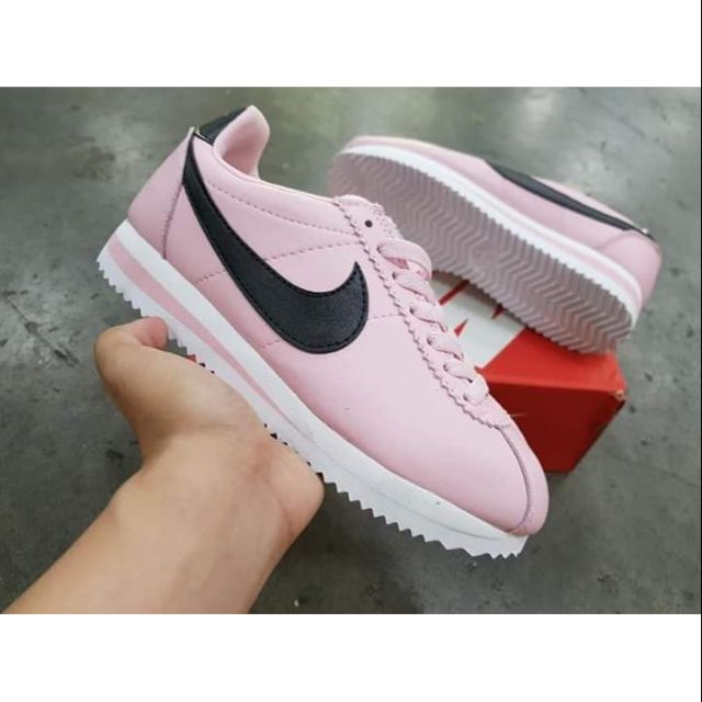 pink and black nike cortez