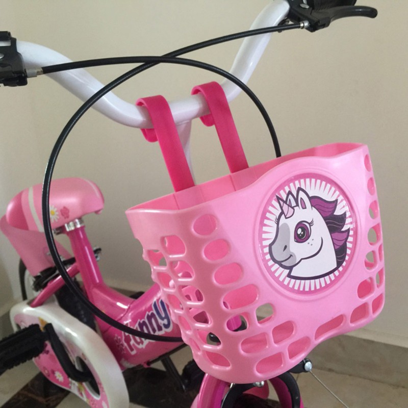 pink toddler bike with basket