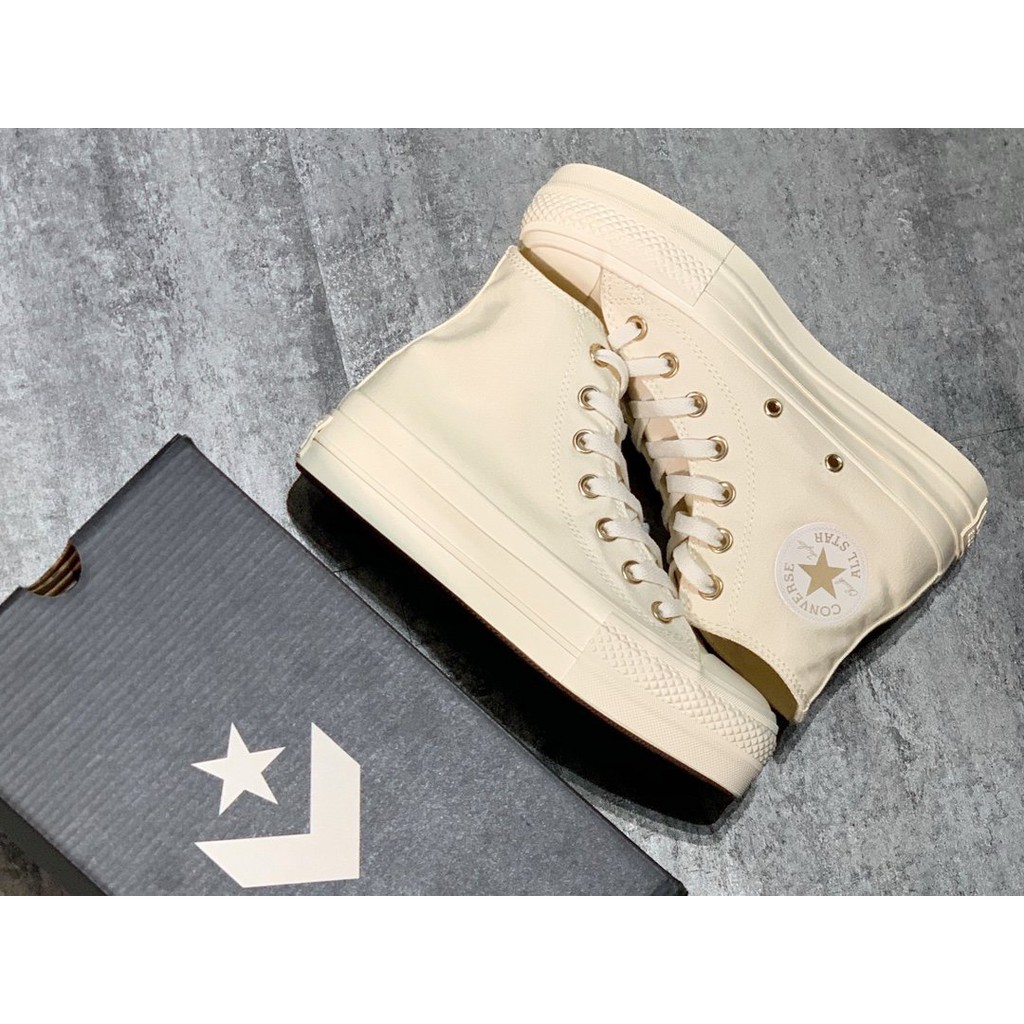 white and gold converse high tops