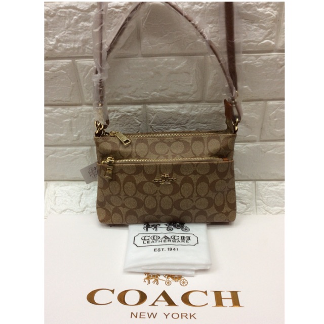 coach mini sling