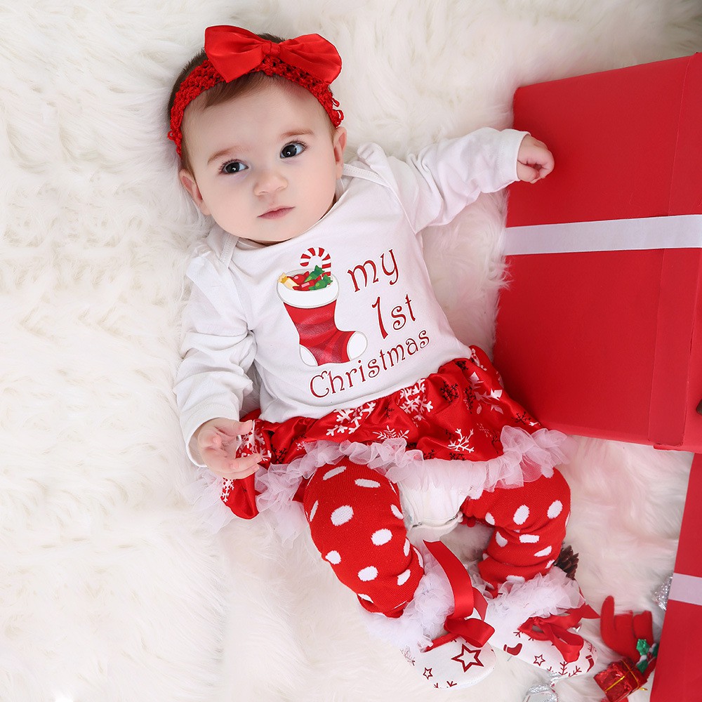 baby in christmas dress