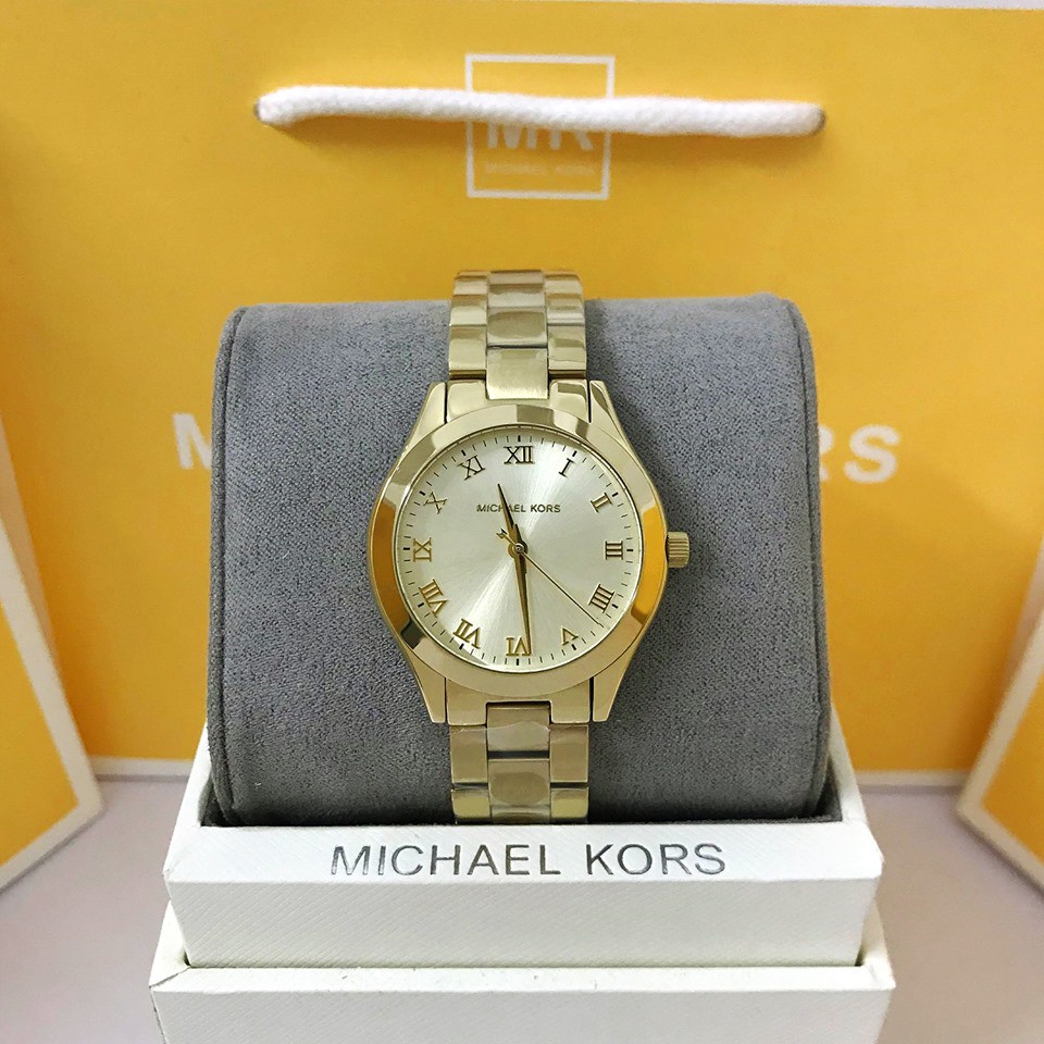 mk slim runway gold
