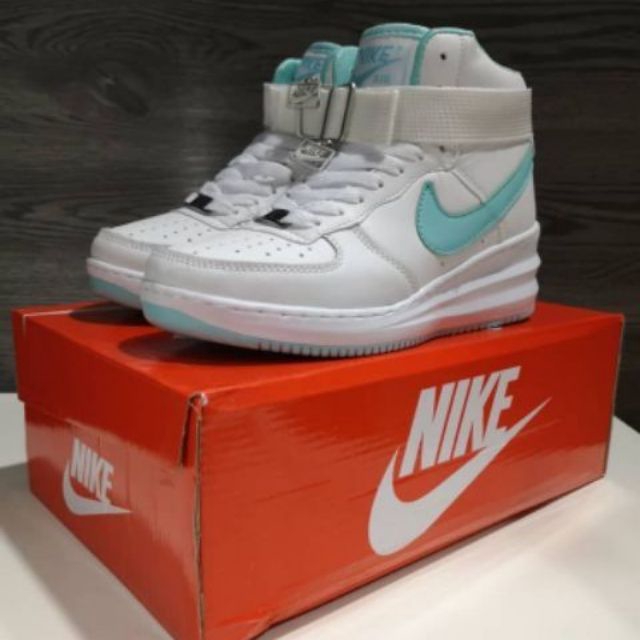 white and turquoise air force ones