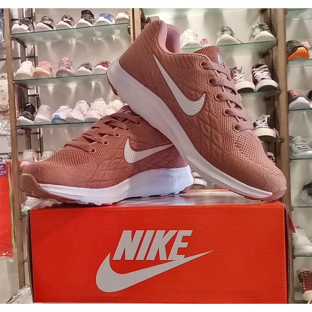 peach nike shoes