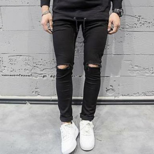 black knee cut jeans